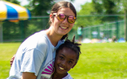 A summer camp counselor and camper at the Jennersville YMCA