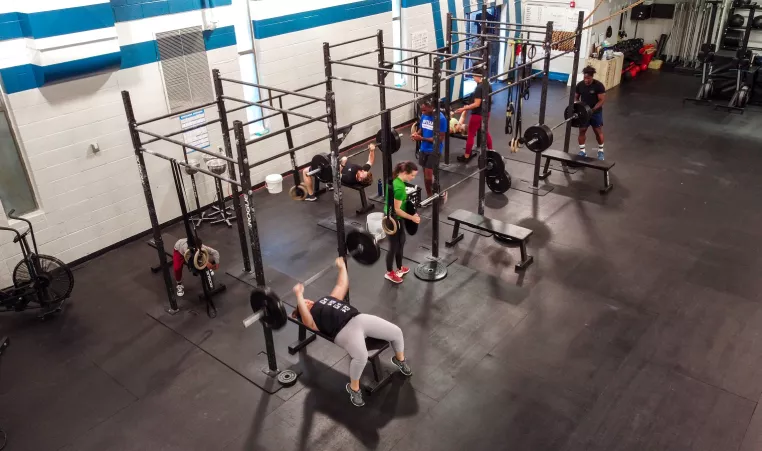 Aerial View of Adults Lifting Weights at East Chestnut Fitness
