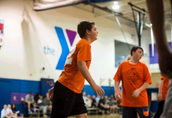 Youth Sports - A teen basketball game at the kennett area ymca in kennett square. 