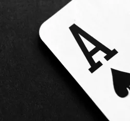 A single ace card is shown on a black background