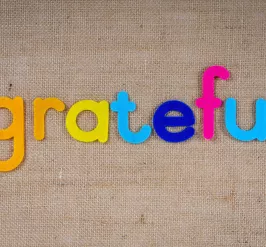 The word grateful spelled out in colorful letters.