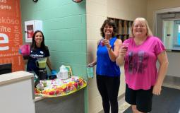 One YMCA staff member and two women enjoying beverages at the Lionville Community YMCA.