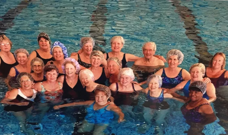 YMCA Member and employee Joan Tobin with her Aqua Fitness class at Upper Main Line YMCA