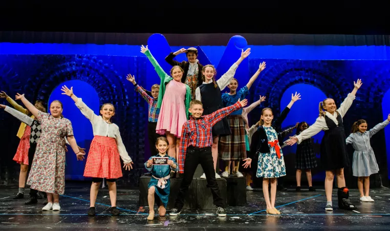 Students in the Jennersville YMCA Performing Arts Company rehearse a performance of Willy Wonka at the Jennersville YMCA Theater