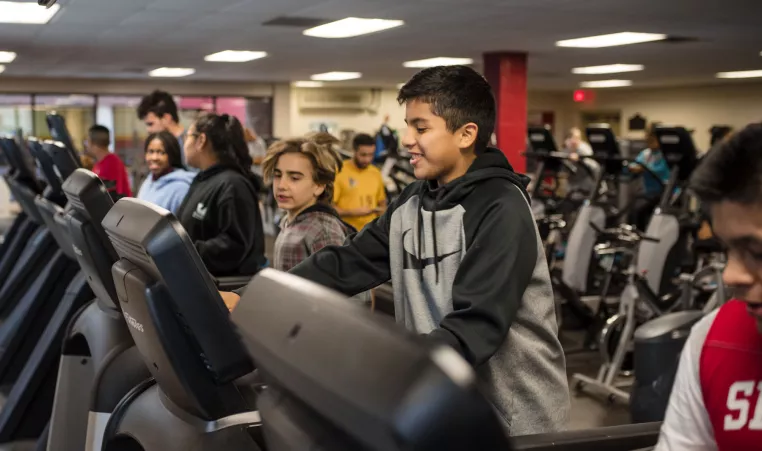 Middle school students learn about the wellness center at the Oscar Lasko YMCA and Childcare Center in downtown West Chester, PA