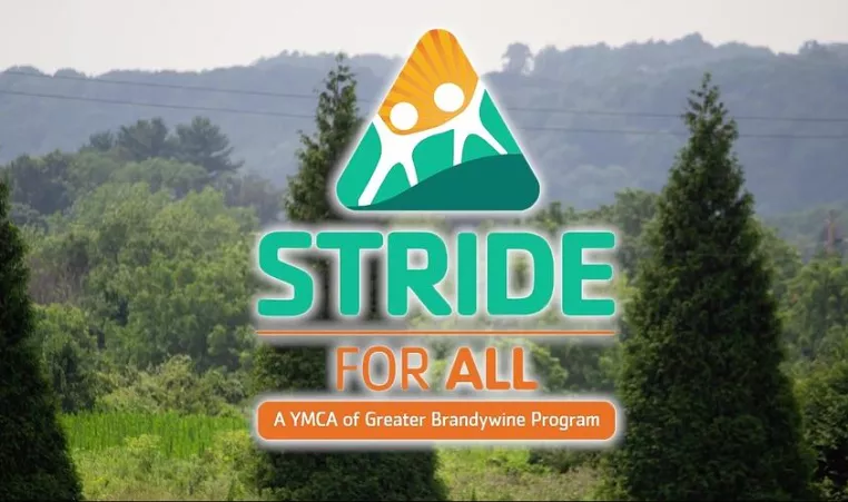 STRIDE for ALL logo over an image of trees in a forest