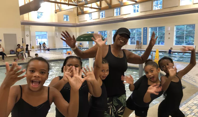 Group of girls from Milton Center learning how to swim at West Chester Area YMCA.