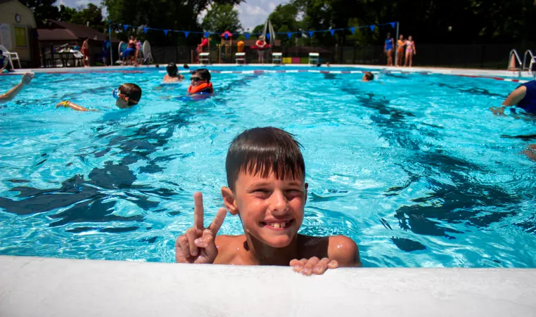 Swimmers enjoy the outdoor pool at the Kennett Area YMCA.