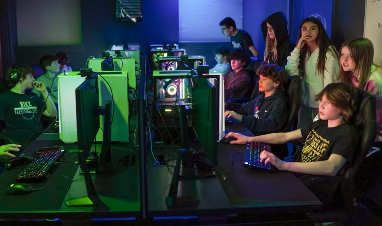 A group of teens participate in esports programming at the YMCA in West Chester