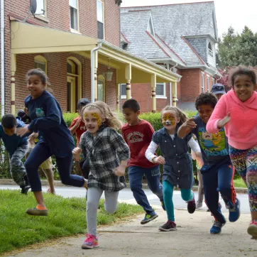 Events - Kids participate in healthy activities like running during Healthy Kids Day events at the YMCA of Greater Brandywine