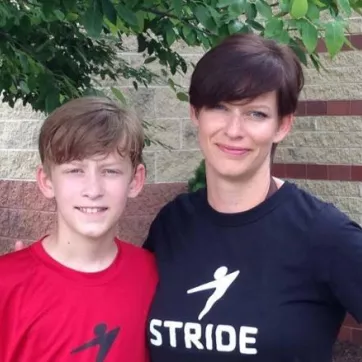 A STRIDE volunteer coach Christy Pickar with her son. 