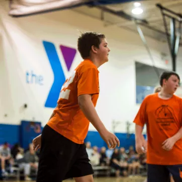Youth Sports - A teen basketball game at the kennett area ymca in kennett square. 