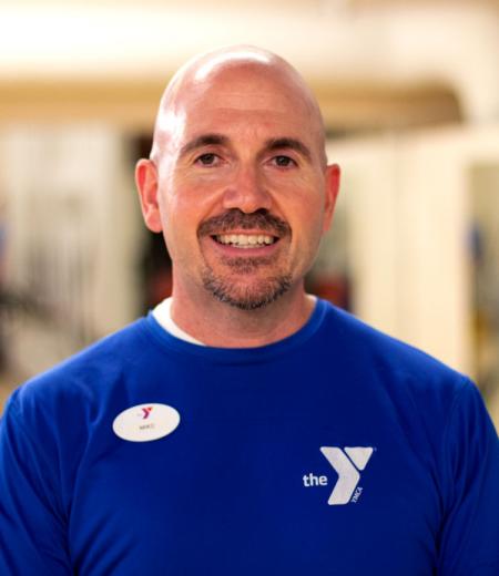 Personal trainer Mike Lobiondo poses for a headshot at the Kennett Area YMCA
