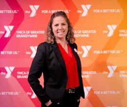 Melanie Weiler standing in front of a Y background 